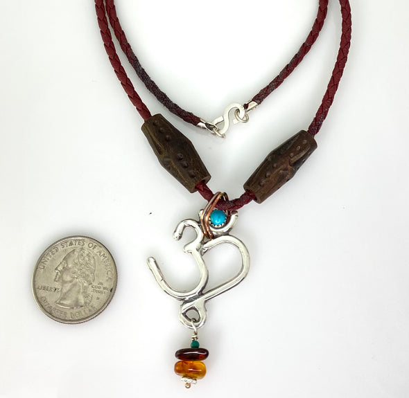 Om Necklace with red leather cord