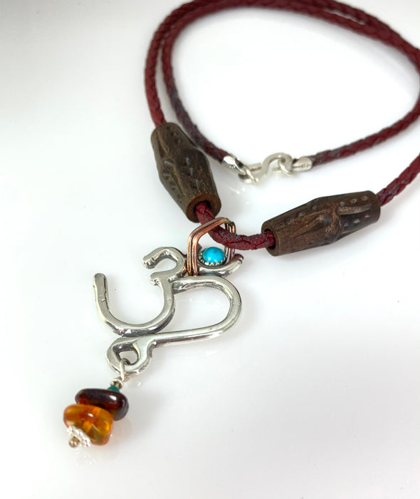 Om Necklace with red leather cord